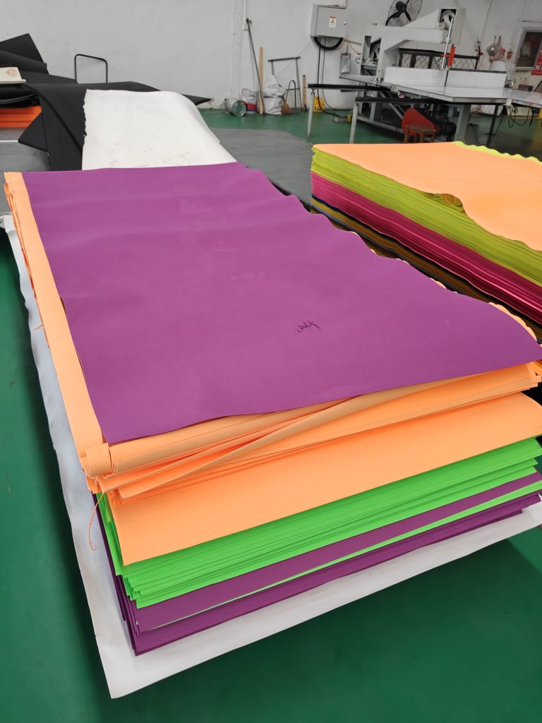 Coloured sheet materials